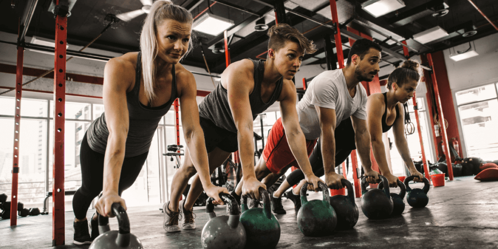 people working out to stave off a weight loss plateau