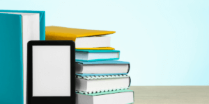 an ipad on a table displaying a rack of books and an ebook on the screen symbolizing how it can be used as a lead capture tool