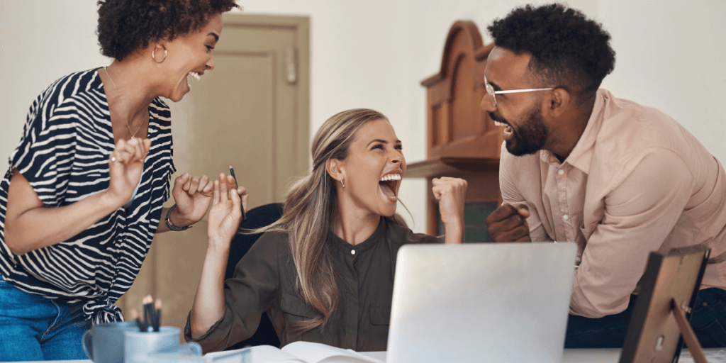 laughing employees in an office