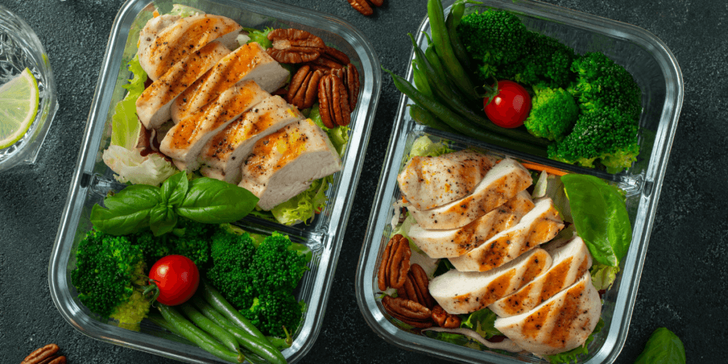 meal prep on a table showing people working on their nutrition and wellness